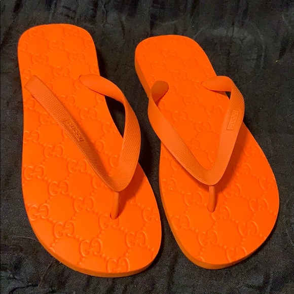 orange gucci flip flops